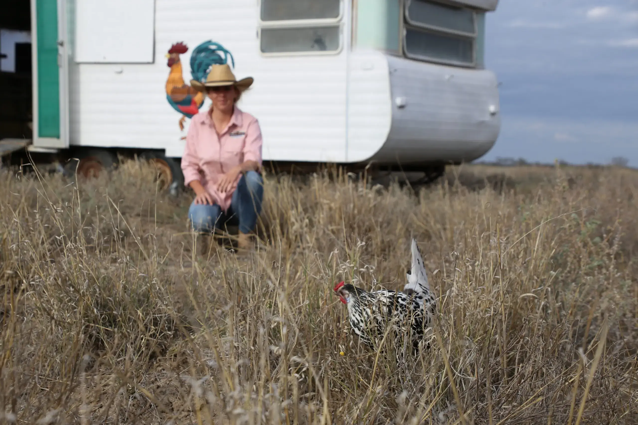 Harriet Finlayson in front of her chicken caravan.